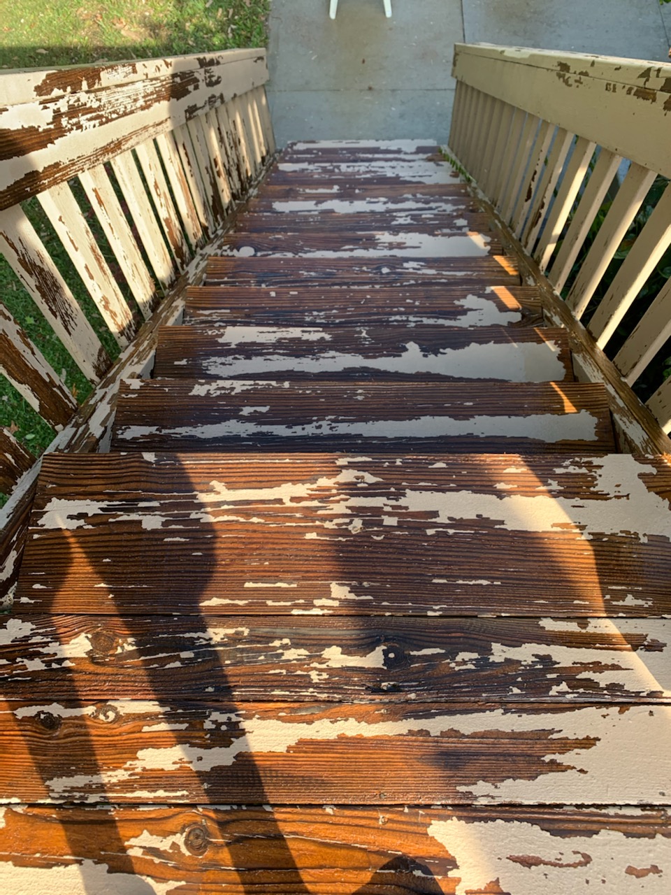 picture of Amelia Ohio Deck steps that have major peeling behr deck over