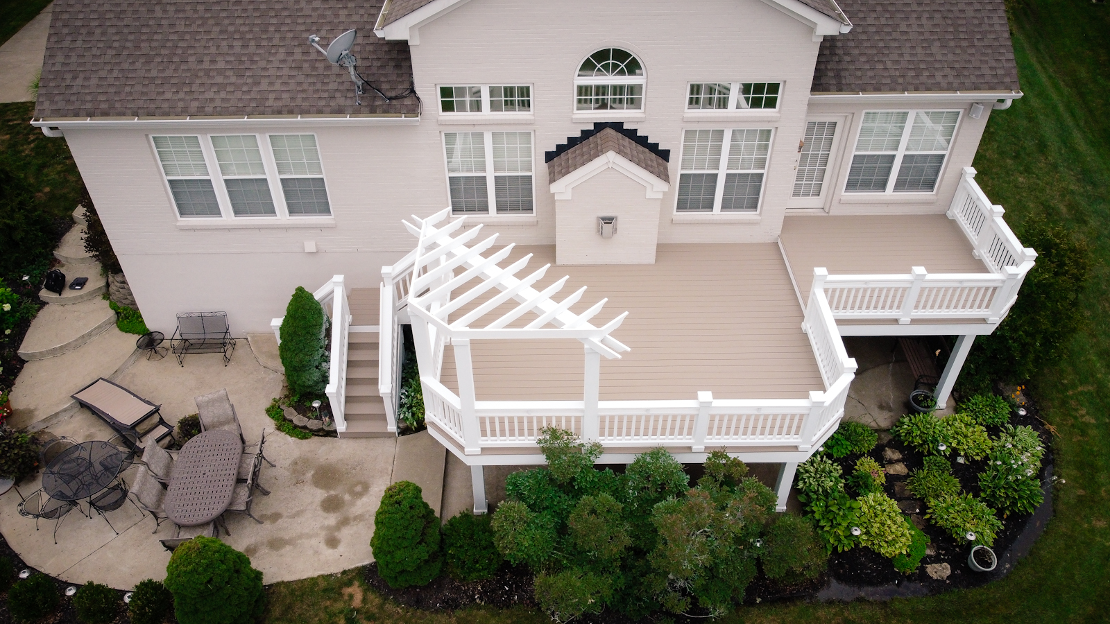 A beige and white two color deck painted by Kong Armor Deck Painters In Union Kentucky